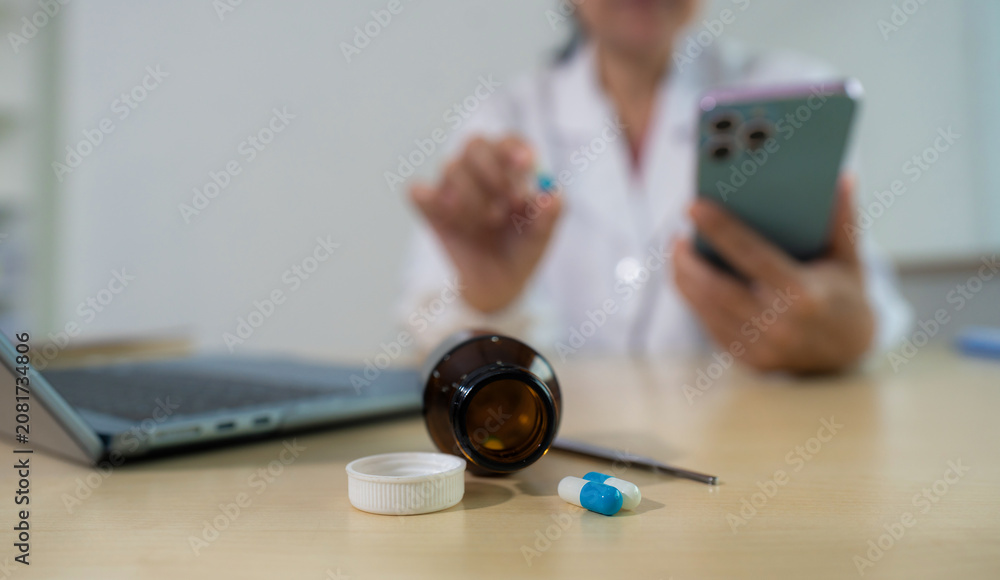 Fototapeta premium pharmacists or doctors study information reviews patient info, medication, and health progress on charts. Collaborative care and analysis.