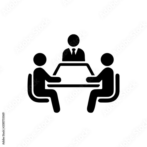 A minimalist vector icon featuring people at a desk using desktop computers. A clean, flat design representing office work.