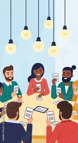 Group of Diverse People Taking Quizzes Around a Table in Bright Room