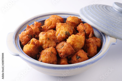 Indian Tasty Moong dal vada, pakora, bhajiya, Yellow Split Gram Fritters served with green chutney