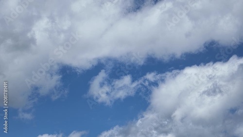 A serene, dynamic sky filled with moving clouds in motion.