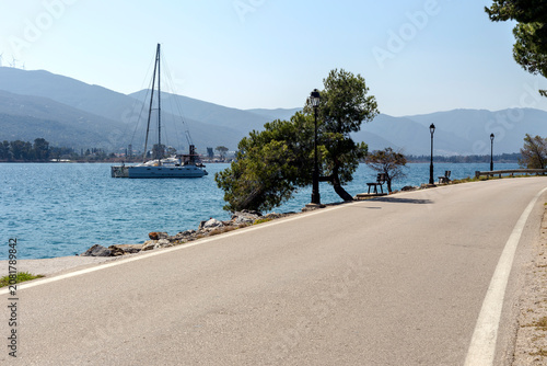 View of the embankment and yachts of the island of Paros (Greece) in a spring evening