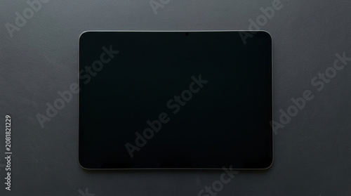 Tablet screen black device technology digital modern blank tablet with black screen dark gray surface for technology mockup, simple electronic