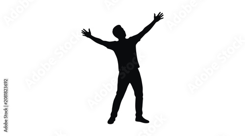 Photography Silhouette of a happy young man standing with arms raised high in the air expres