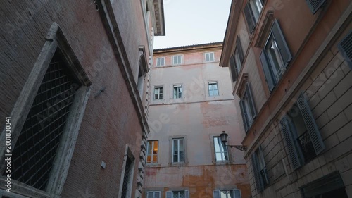 Looking Up Between Historic Buildings in a Narrow Rome Street