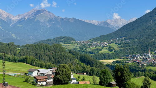 Canvastavla Austrian Alpine Summer Landscape with Rolling Hills and Tiny Villages
