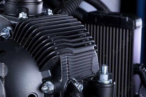 Industrial Compressor Close Up With Cooling Fins And Metal Bolts