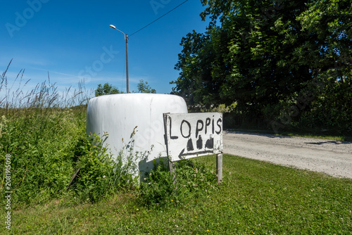 Fotografija Sandvik, Sweden A hay bale and a sign in Swedish for a rummage sale, Loppis