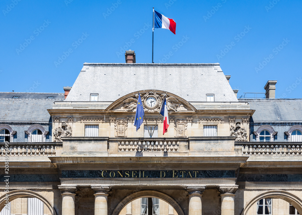 Obraz premium Paris, France - June 17, 2026: Front view of the portico of the Council of State, a public body created in 1799 by Napoleon, decked with french and European Union flags, located in the Palais Royal.