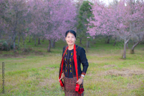 Portrait Photo of Northeastern Thai women with traditional costumes.Thai silk dress concept