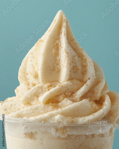 vanilla soft serve, soft serve ice cream, vanilla ice cream, ice cream cup, frozen dessert, creamy dessert, swirl ice cream, soft serve swirl, dessert cup, sweet treat, dairy dessert, cold dessert, 