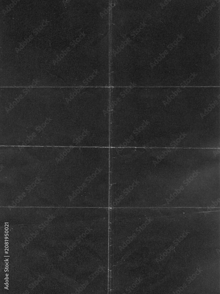 Fototapeta premium Abstract dark charcoal paper texture with subtle grid lines and vintage grain