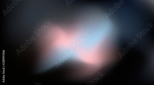 Soft out of focus colorful shapes in dark background