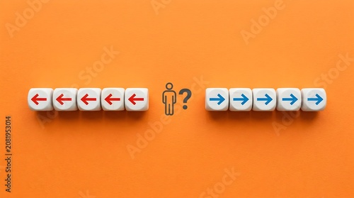Uncertainty concept with dice cubes showing opposing arrows and question mark