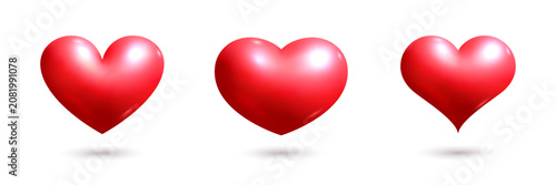 Photos Three red hearts with shadows on white background