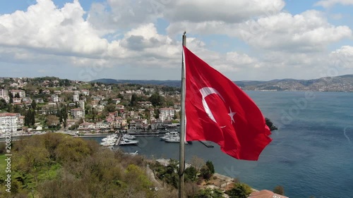 Aerial view of the Bosphorus with tulips; view of the Turkish flag; general aerial view of Istanbul