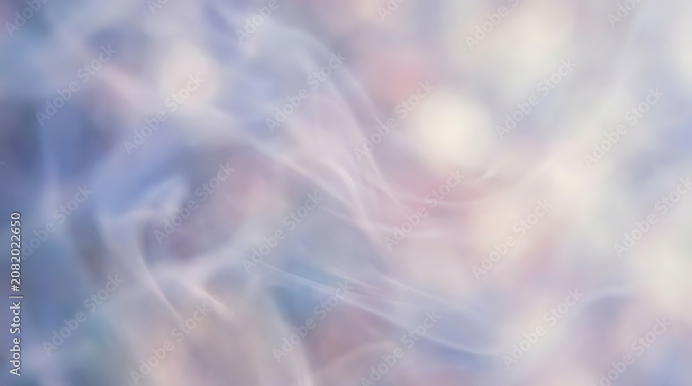 Obraz premium A soft, blurred image with pastel hues and wispy white lines