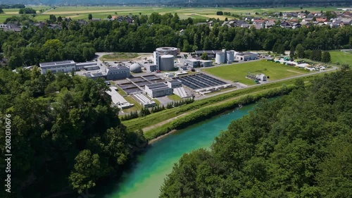 This facility features settling tanks and filtration systems for water recycling and supports municipal services in a suburban setting.