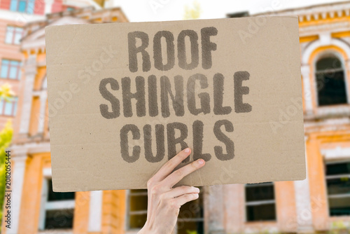 Canvas Print "Roof shingle curls" Asphalt tiles warp from sunlight