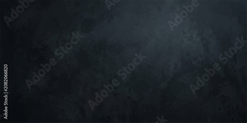 Abstract dark textured wall with a moody atmosphere and subtle vignetting, creating a sophisticated backdrop for artistic photography or elegant graphic design projects.