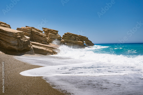 Close-up of rock formations on Triopetra Beach, where they are hit by the waves of the Mediterranean Sea