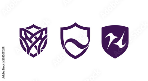 Three purple shield icons with abstract designs inside.