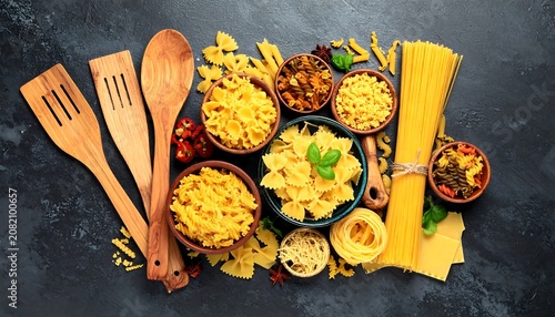 Assorted pasta and cooking utensils