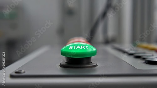 ?Pressing the start button on industrial control panel: activation sequence