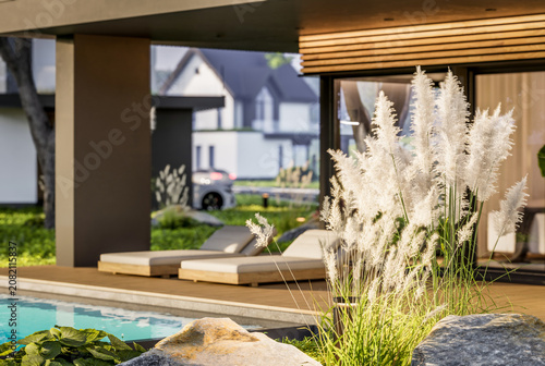 3d rendering of contemporary architectural luxury house exterior. Modern Scandinavian style family home with a white plaster walls, dark roof, and beautiful garden at golden hour