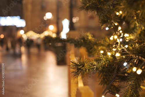 Christmas lights decorating urban street at night