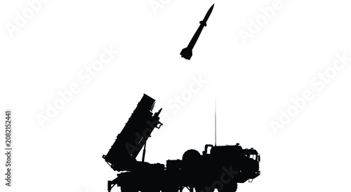 Schilderij op canvas Missile launcher vehicle in black silhouette military