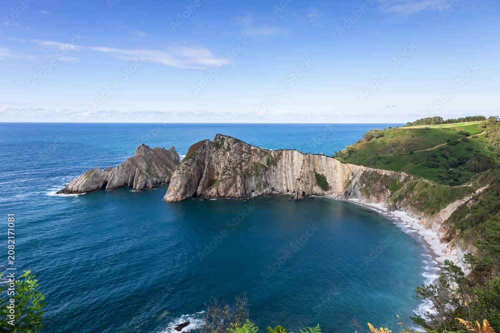 Fototapeta premium Coastal Landscape with Rocky Cliffs and Bay. Silencio beach in Cudillero, Asturias, Spain