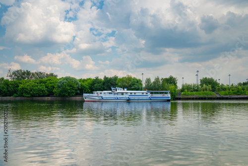 Pleasure boat on the river at summer