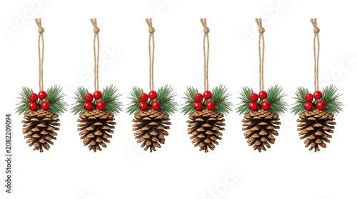 Six hanging pine cone ornaments with holly berries for holiday isolated on transparent background
