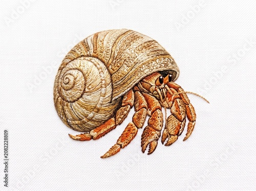 Intricate golden tortoise embroidery art isolated on white background
