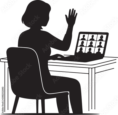 Woman sitting at desk waving at laptop screen with multiple people on it