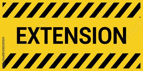 Yellow caution extension sign with black diagonal stripes and bold text