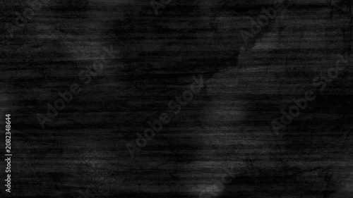 dark grunge wood texture showing an eerie abstract concrete wall background with a moody atmosphere