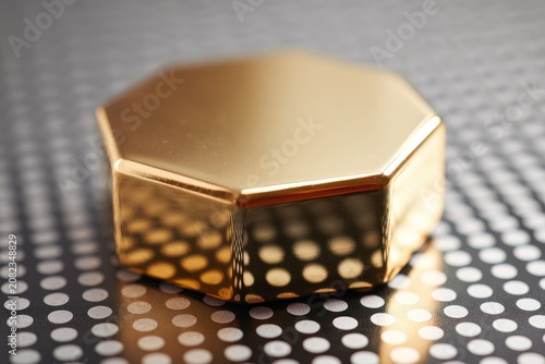 Gold octagon on halftone background with reflective metal finish