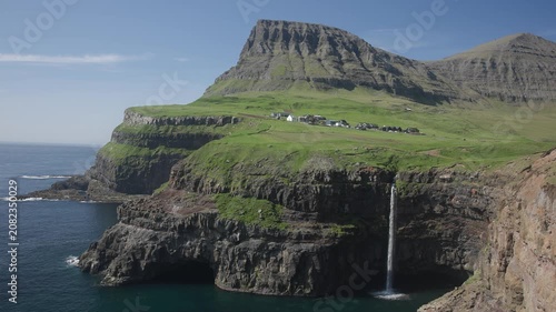 Múlafossur Waterfall on sunny day in Faroe Islands
