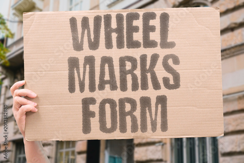Billede på lærred "Wheel marks form" Vehicle tracks become permanent impressions