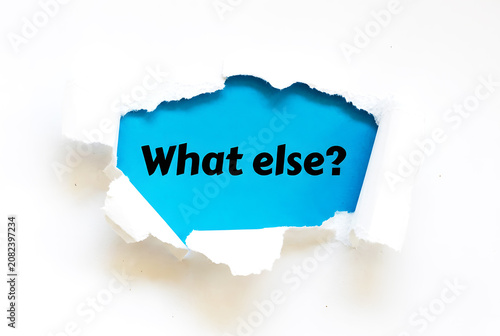 What Else Question Revealed Through Torn White Paper On Purple Background For Creative Thinking And Business Brainstorming Concept