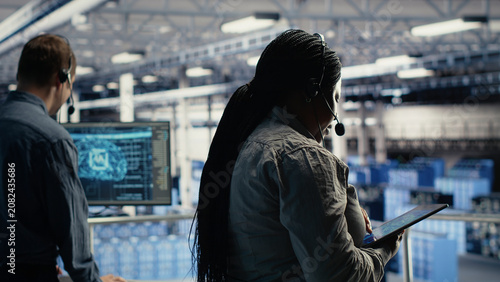 Photos Data center colleagues use AI tools to help customers resolve website hosting problems and service interruptions