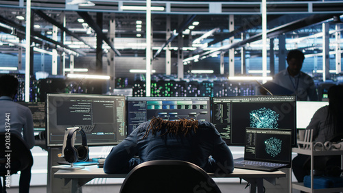 Cuadro en lienzo Irked high tech server room IT specialist smashing desk, upset by faulty equipment
