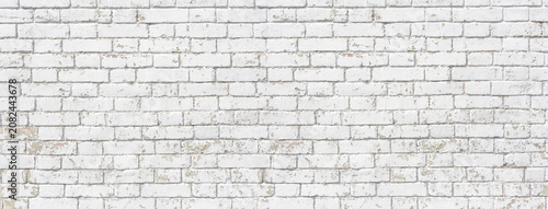 White weathered brick wall texture background surface pattern