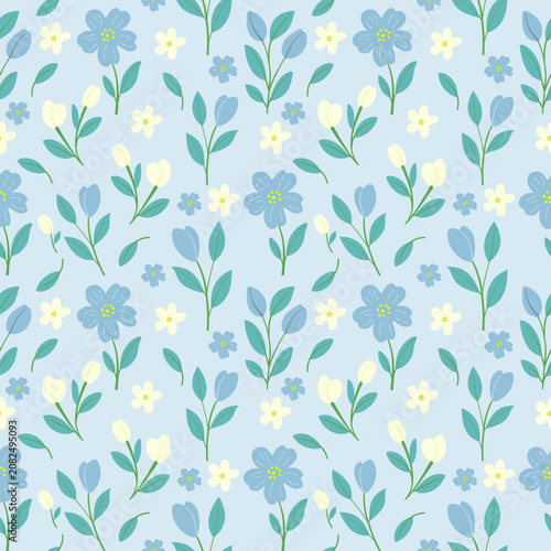 Floral Delight: A charming seamless pattern featuring delicate blue and yellow wildflowers with green stems and leaves on a soft blue background, perfect for textile design and spring themes.