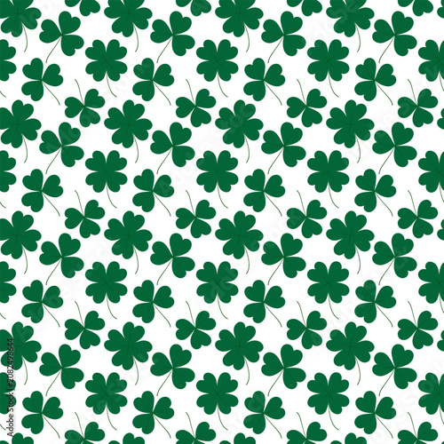 Repeating seamless pattern of four leaf clovers and shamrocks scattered across white background. Minimal flat design Poster or web promo banner, label, price tag, greeting thematic card, post backdrop
