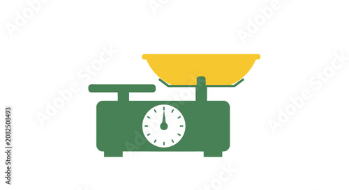 Green vintage weighing scale with yellow tray.