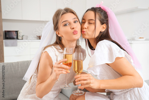 Young woman and her bridesm...