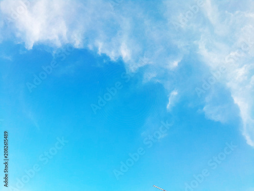 bright blue sky with clouds